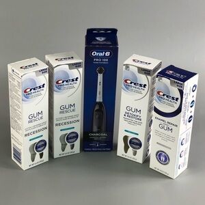 Oral-B Pro 100 Electric Toothbrush with Crest Gum Rescue Toothpaste Set